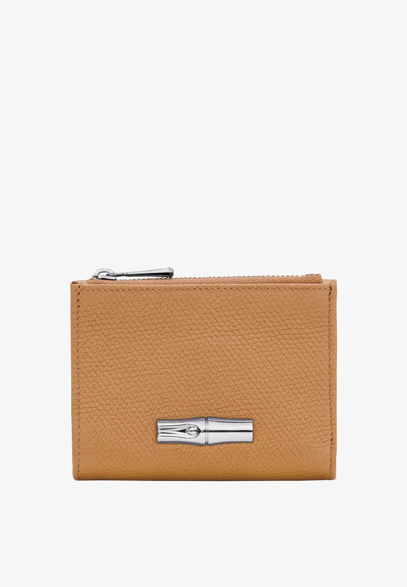 Leather wallet in a tan color with a textured surface, featuring a silver metal accent and a zip closure along the top edge.