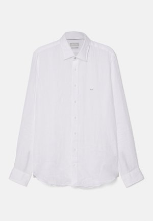 White long-sleeve shirt made of linen. Features a pointed collar, full button front, and a small embroidered logo on the left chest.