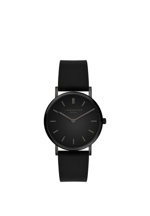 Schwarze analoge Armbanduhr mit minimalistischem Design, schwarzem Armband und dezenten Stundenmarkierungen, zeigt die Zeit 10:10 an.