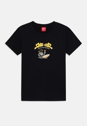 Black cotton t-shirt featuring a colorful graphic of an eight-ball, surfboard, and text “Santa Cruz Skateboards” in yellow.