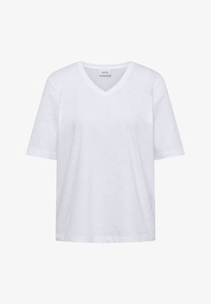 T-shirt blanc à manches courtes avec col en V, coupe décontractée et texture de tissu visible, avec l'étiquette "CECIL" à l'intérieur du col.