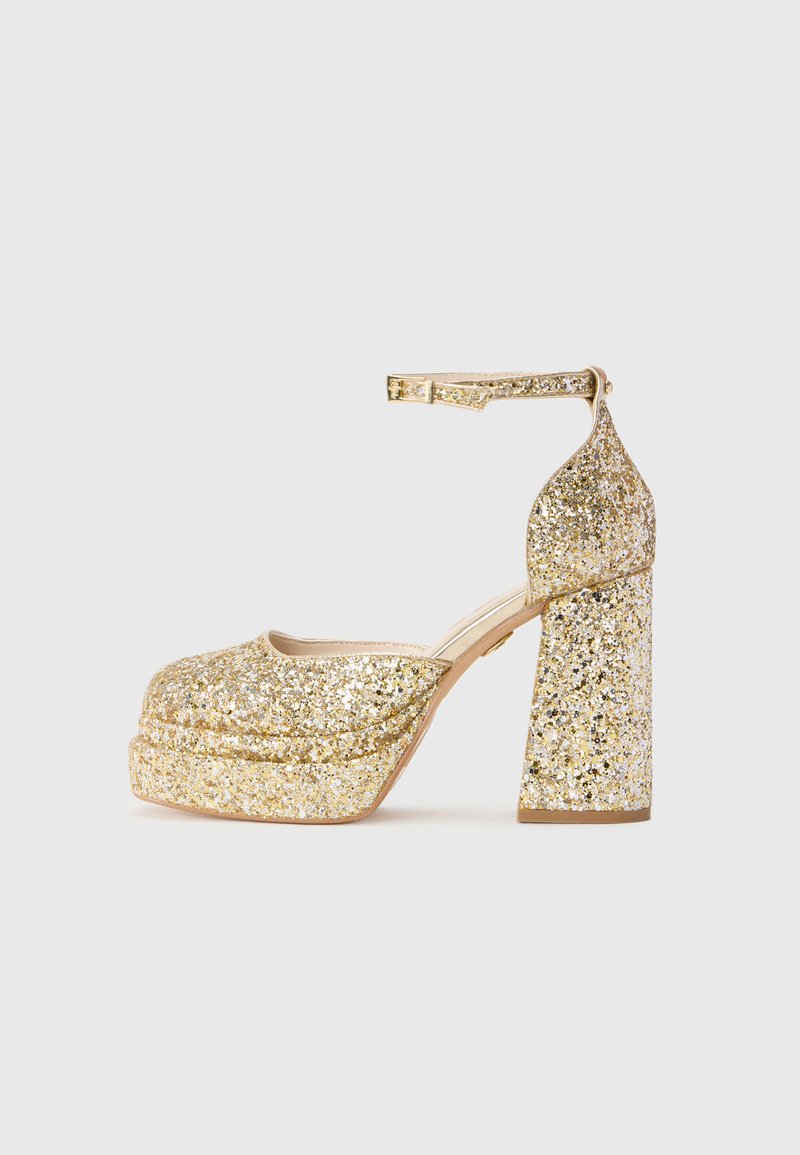 Buffalo Plateaupumps goudkleurig