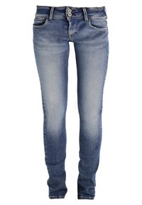 Tajta jeans i blekt blå denim, med två metallknappar, fem fickor och synliga sömnadsdetaljer längs sömmarna.