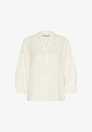 Weiße Bluse mit langen Ärmeln, rundem Kragen, Knopfleiste und gerafften Ballonärmeln. Hergestellt aus leichtem, strukturiertem Stoff.