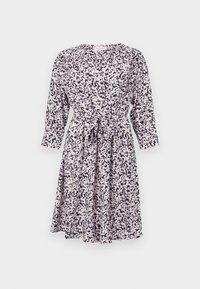 Napinpaita, jossa on 3/4-hihat, vyötärösolki ja abstrakti mustavalkoinen kuvio vaalealla taustalla.