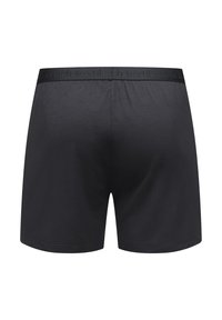 Schwarze Boxershorts aus glattem Stoff, mit einem breiten elastischen Bund mit geprägtem Text. Einfaches, elegantes Design ohne Muster.