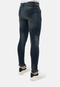 Local Fanatic RIPPED SLIM FIT STRETCH - Slim fit jeans - blauw