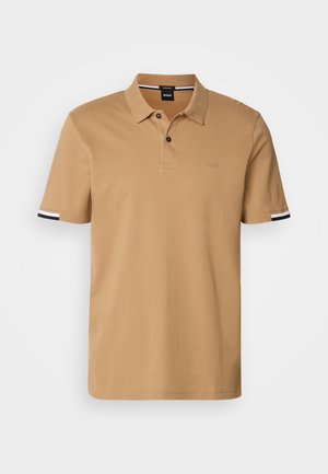 Tan polo shirt van katoen, met korte mouwen, een twee-knopen placket, geborduurd logo op de borst en contrasterende gestreepte accenten op de mouwen.