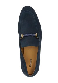 Navy suede loafers with a stitched design, featuring a braided blue accent band and gold hardware. Leather insole visible inside.