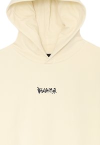Felpa color crema con un piccolo logo stilizzato "Disclaimer" in nero centrato sul petto sotto il cappuccio.