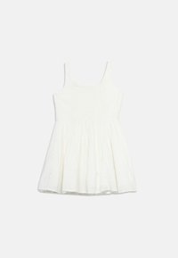 Robe blanche sans manches avec corsage froncé et motif floral en œillet sur la jupe, présentée sur un fond blanc uni.