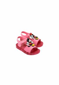 Pink plastic sandals with glittery soles, featuring raised Mickey and Minnie Mouse designs on the straps. Open-toe and backstrap design.
