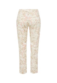 Pantalon slim couleur crème avec motif floral abstrait rose et beige et poches latérales, vu de dos sur fond blanc.