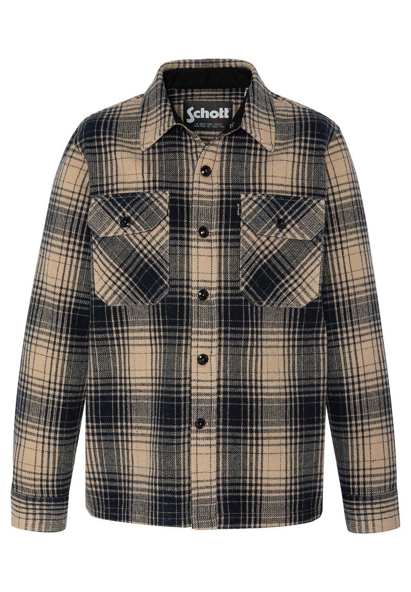 Camicia in flanella a quadri in beige e blu navy, con due tasche frontali, bottoni neri e colletto a punta. Texture morbida.