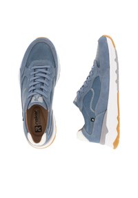 Blue suede sneakers with white and grey accents, featuring a textured surface, round laces, and a cushioned white sole with a gum rubber outsole.