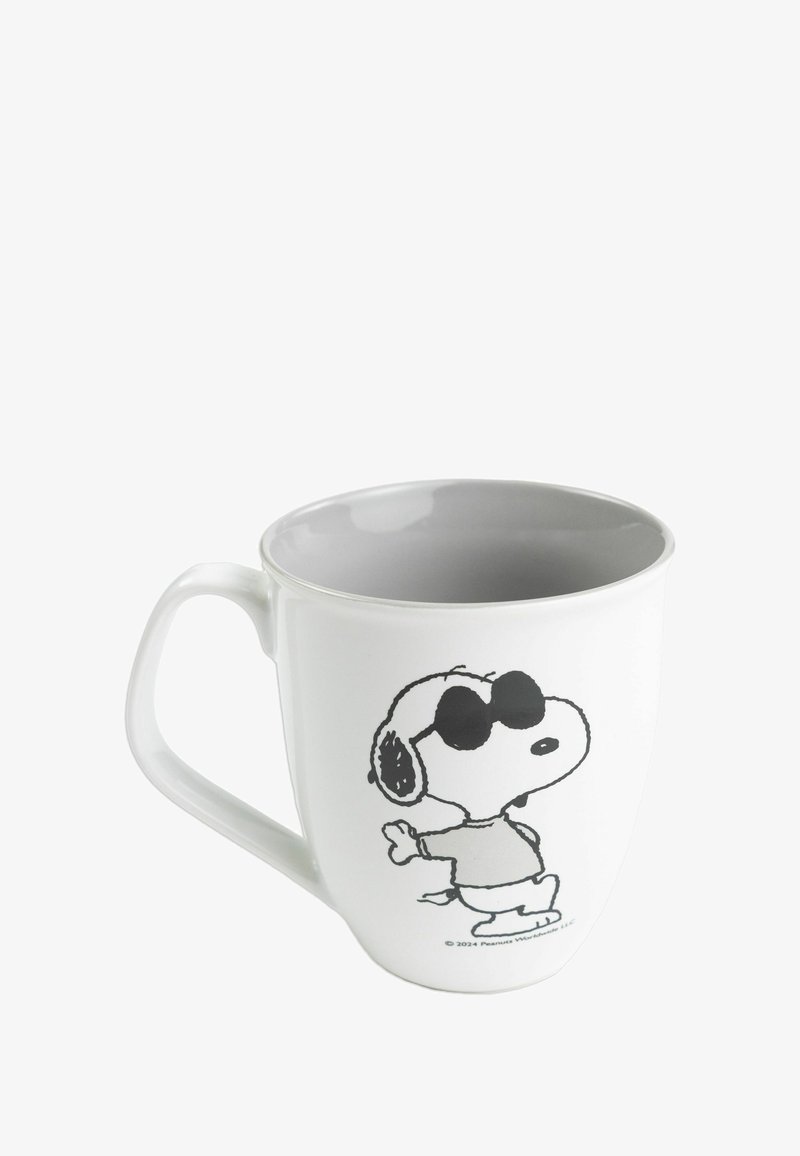 White ceramic mug with gray interior, featuring a black outline of a dog wearing sunglasses and a shirt, standing with one paw raised.