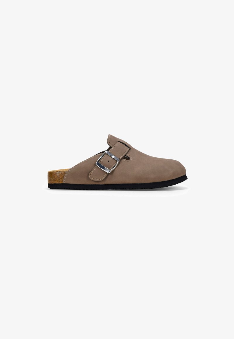 Brown suede clog with a rounded toe, adjustable silver buckle, and natural cork footbed, featuring a black rubber sole.