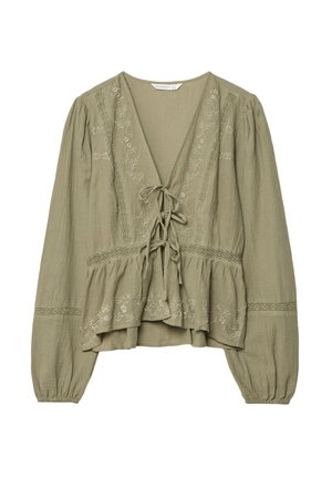 Blusa verde oliva con maniche lunghe, scollatura a V, dettagli con fiocco, motivo floreale ricamato e orlo a peplum. Realizzata in un tessuto testurizzato.