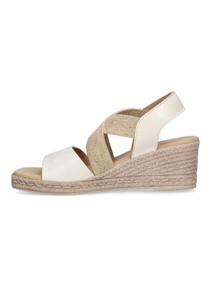 Sandalia de cuña blanca con tiras de tela entrecruzadas, suela de yute trenzado y acabado texturizado. Cuenta con una parte superior de cuero suave y plantilla acolchada.