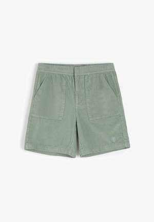 Jasnozielone szorty z korduroy z elastycznym pasem, z dwoma przednimi kieszeniami i akcentem z logo w pobliżu dolnej krawędzi. Teksturowany materiał.