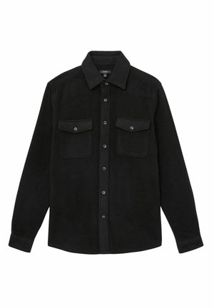 Camicia flanella nera con design a bottoni, due tasche sul petto e colletto classico. Tessuto liscio con stoffa semplice e senza motivi.