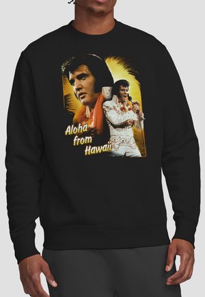 Schwarzer Pullover mit Grafik eines Sängers im weißen Overall, der ein Mikrofon hält, und dem Schriftzug "Aloha from Hawaii".
