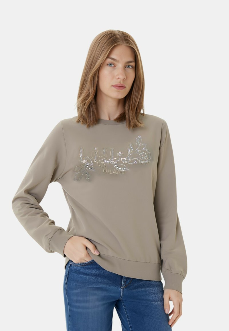 Felpa grigia a maniche lunghe, con scollatura a girocollo e decorazioni argento in design floreale. Tessuto morbido con vestibilità rilassata.