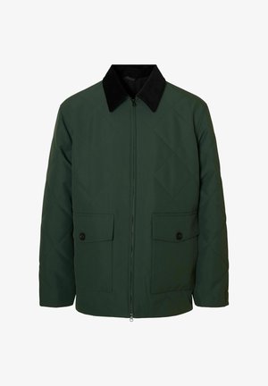 Zeleno prešito jopico z ovratnikom iz črnega kordura, sprednjim zadrgo in dvema žepe s pokrovom na gumb. Struktura v obliki diamanta po vsej površini.