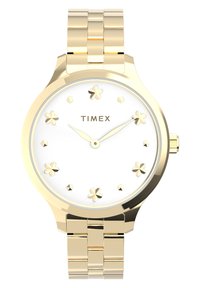 Reloj Timex en tono dorado con una cara blanca, marcadores de horas en forma de flores y acentos dorados. Presenta un diseño de pulsera con eslabones y un acabado pulido.
