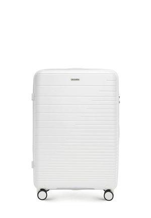 White hard-shell suitcase with horizontal striped design, smooth texture, top handle, and four wheels for easy maneuverability.