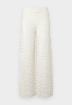 Pantaloni a gamba larga in crema, caratterizzati da un motivo a costine trapuntato, vita elasticizzata e tessuto liscio con una leggera lucentezza.