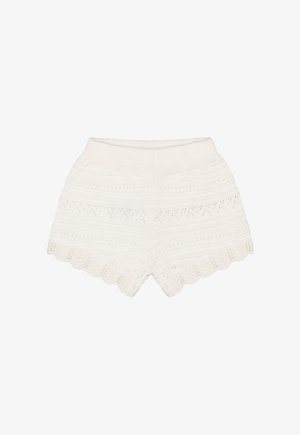 Weiße gestrickte Shorts mit aufwendigen Mustern, ausgestattet mit einem geschwungenen Saum und einem strukturierten Taillenbund. Maschinenwaschbarer, leichter Stoff.
