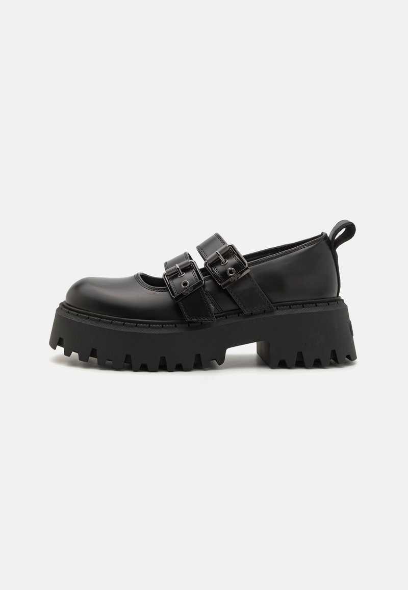 Sorte platform-sko med rund tå, flere spænder og en tekstureret, kraftig sål. Fremstillet af shiny syntetisk materiale.