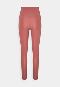 Legginsy z wysokim stanem, dopasowane, w stonowanym kolorze różowym. Wykonane z gładkiego, elastycznego materiału bez widocznych wzorów lub akcentów.