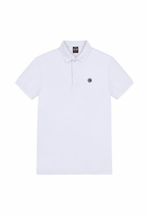 Witte polo met korte mouwen, twee knopen, een kraag en een klein cirkelvormig logo op de linkerborst.
