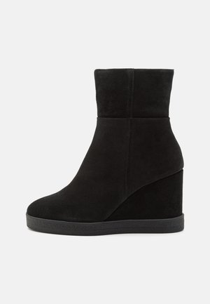 Botines de cuña - black