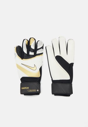 Guanti da portiere con un design bianco e oro, caratterizzati da una presa testurizzata, un polsino in rete nera e il marchio Nike.
