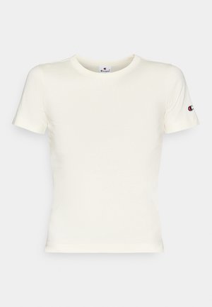 Κρεμ κοντομάνικο μπλουζάκι φτιαγμένο από βαμβάκι, με στρογγυλή λαιμόκοψη και κεντημένο λογότυπο στο αριστερό μανίκι. Λείος υφάσματος, κλασική γραμμή.