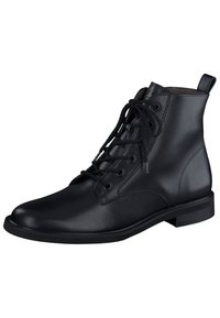 Bottine en cuir noir à bout rond, avec un laçage à l'avant et un petit talon. Présente une texture lisse et un design minimaliste avec des accents latéraux.