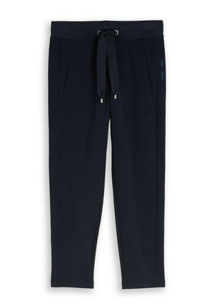 Granatowe zwężane spodnie dresowe z regulowanym paskiem w talii, bocznymi kieszeniami i małą naszywką z logo na prawej biodrze.