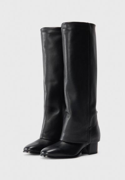 Black leather knee-high boots with a smooth texture, square toe, and block heel. Simple design with no visible hardware or patterns.