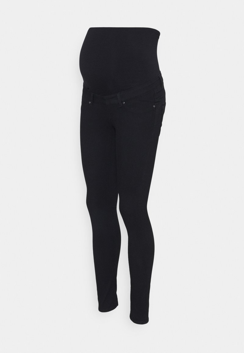 Leggings de maternité en noir, en tissu extensible, dotés d'une taille haute pour le soutien et d'un design ajusté, avec des poches sur les côtés.