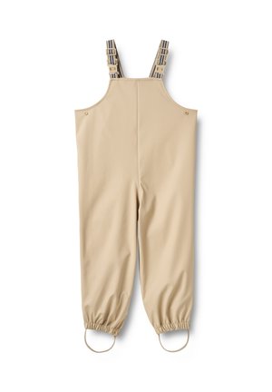 Beige vandtætte overalls med justerbare, stribede seler, elastiske ærmekanter og trykknapdetaljer. Glat tekstur, fuld længde, praktisk design.
