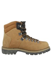 Botas de senderismo de ante beige con un puño de cuero marrón, ojales de metal y suela de goma duradera con profundas estrías para una buena tracción.