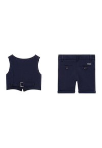 Top senza maniche blu navy con chiusura sul retro e pantaloni corti abbinati con due bottoni posteriori e orlo arrotolato.