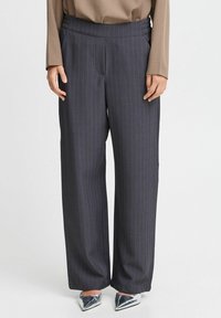 Wide-leg trousers in dark gray with thin vertical stripes. Made of smooth fabric. Features an elasticated waistband for comfort.