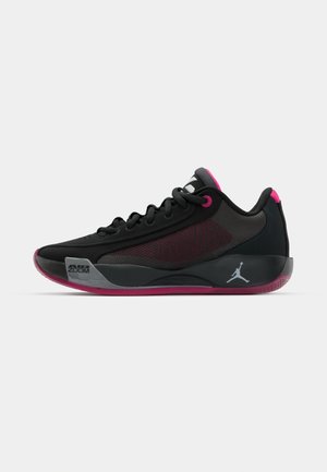 Sneaker sportive nere realizzate in materiali sintetici e mesh, con accenti rosa, colletto imbottito, suola in gomma e marchio Air Zoom.
