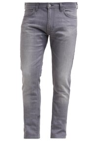 Jean slim gris en denim avec cinq poches, fermeture à boutons et passants pour ceinture, présentant un léger délavage sur les cuisses et les genoux.