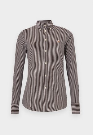 Pruunide ja koorevärviliste triipudega pikkade varrukatega särk, nööbitava kraega, millel on väike logo ja kontrastsed mansetinurkade triibud.