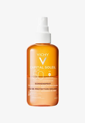 Sunscreen spray bottle, 200 ml, transparent amber plastic with a white spray nozzle. Label features product details in white text.